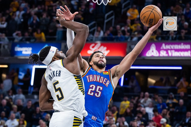 Oct 23, 2025; Indianapolis, Indiana, USA;  Oklahoma City Thunder guard Ajay Mitchell (25) shoots the ball while Indiana Pacers forward Jarace Walker (5) defends in the second half at Gainbridge Fieldhouse. Credit: Trevor Ruszkowski-Imagn Images