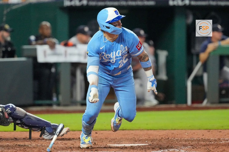 Jun 13, 2026; Kansas City, Missouri, USA; Kansas City Royals catcher Carter Jensen (22) hits a three run double against the Houston Astros during the sixth inning at Kauffman Stadium. Credit: Denny Medley-Imagn Images