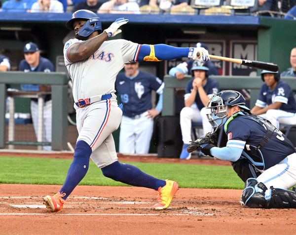 KANSAS CITY, MO - MAY 03: Texas Rangers designated hitter Adolis Garcia 953) singles in the first inning during a MLB game on May 03, 2024, between the Texas Rangers and the Kansas City Royals at Kauffman Stadium, Kansas City, MO.  (Photo by Keith Gillett/Icon Sportswire)