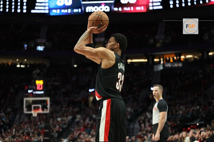 Nov 5, 2025; Portland, Oregon, USA;  Portland Trail Blazers forward Toumani Camara (33) shoots the ball against against the Oklahoma City Thunder during the second half at Moda Center. Credit: Jaime Valdez-Imagn Images

