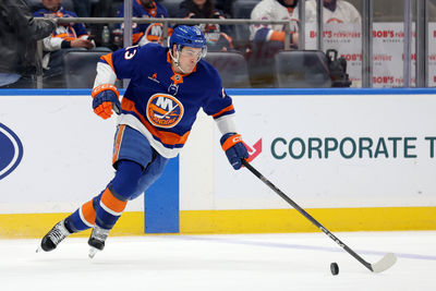 Jan 25, 2025; Elmont, New York, USA; New York Islanders center Mathew Barzal (13) plays the puck against the Carolina Hurricanes during the third period at UBS Arena. Mandatory Credit: Brad Penner-Imagn Images