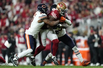 Dec 28, 2025; Santa Clara, California, USA;  Chicago Bears safety Kevin Byard III (31) and safety Jaquan Brisker (9) tackle San Francisco 49ers running back Brian Robinson Jr. (3) in the first half at Levi's Stadium. Mandatory Credit: Kyle Terada-Imagn Images