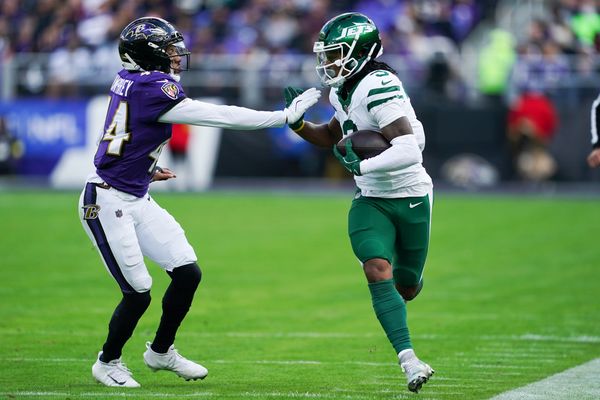 Nov 23, 2025; Baltimore, Maryland, USA; New York Jets wide reciever John Metchie III (3) runs after making a catch as Baltimore Ravens cornerback Marlon Humphrey (44) defends during the second quarter at M&T Bank Stadium. Mandatory Credit: Mitch Stringer-Imagn Images