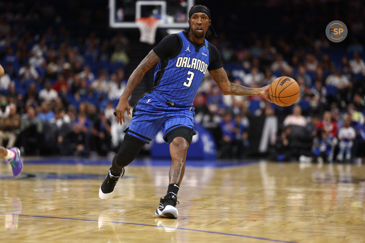 Nov 8, 2024; Orlando, Florida, USA; Orlando Magic guard Kentavious Caldwell-Pope (3) passes the ball against the New Orleans Pelicans in the first quarter at Kia Center. Credit: Nathan Ray Seebeck-Imagn Images