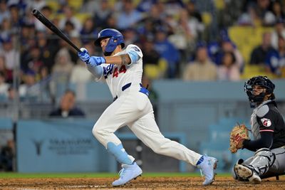 Apr 1, 2026; Los Angeles, California, USA;  Los Angeles Dodgers center fielder Andy Pages (44) doubles in the eighth inning against the Cleveland Guardians at Dodger Stadium. Mandatory Credit: Jayne Kamin-Oncea-Imagn Images