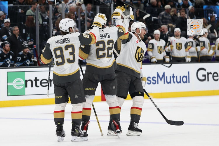 May 1, 2026; Salt Lake City, Utah, USA; Vegas Golden Knights right wing Cole Smith (22) celebrates  with right wing Mitch Marner (93) and right wing Cole Smith (22) after scoring a goal against the Utah Mammoth during the third period in game six of the first round of the 2026 Stanley Cup Playoffs at Delta Center. Credit: Rob Gray-Imagn Images