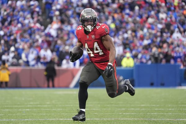 Nov 16, 2025; Orchard Park, New York, USA;  Tampa Bay Buccaneers running back Sean Tucker (44) runs the ball for a touchdown against the Buffalo Bills during the second half of the game at Highmark Stadium. Mandatory Credit: Gregory Fisher-Imagn Images