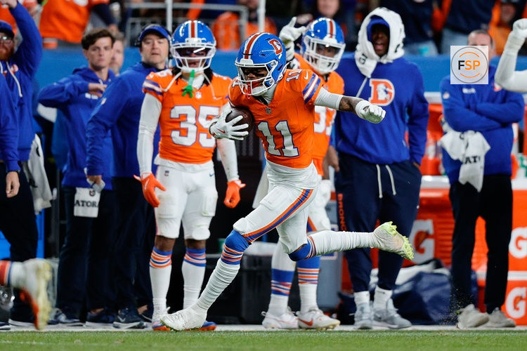Nov 6, 2025; Denver, Colorado, USA; Denver Broncos wide receiver Troy Franklin (11) runs the ball on a reception in the fourth quarter against the Las Vegas Raiders at Empower Field at Mile High. Credit: Isaiah J. Downing-Imagn Images