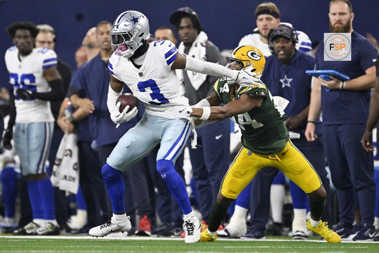 Sep 28, 2025; Arlington, Texas, USA; Dallas Cowboys wide receiver George Pickens (3) catches a pass against Green Bay Packers cornerback Carrington Valentine (24) in overtime at AT&T Stadium. Credit: Jerome Miron-Imagn Images