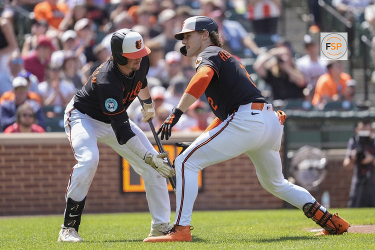 May 18, 2025; Baltimore, Maryland, USA; Baltimore Orioles first baseman Ryan O'Hearn (32) congratulates Baltimore Orioles shortstop Gunnar Henderson (2) for hitting a home run against the Washington Nationals during the sixth inning at Oriole Park at Camden Yards. Credit: Gregory Fisher-Imagn Images