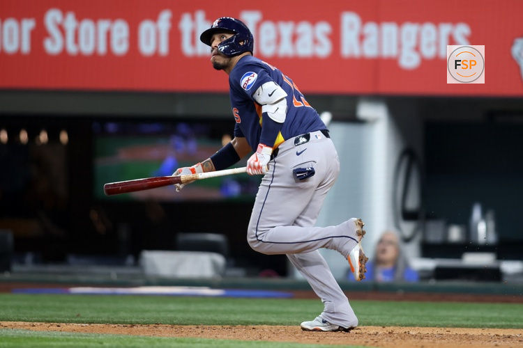 May 18, 2025; Arlington, Texas, USA; Houston Astros third base Isaac Paredes (15) hits a three run home run during the eighth inning against the Texas Rangers at Globe Life Field. Credit: Tim Heitman-Imagn Images