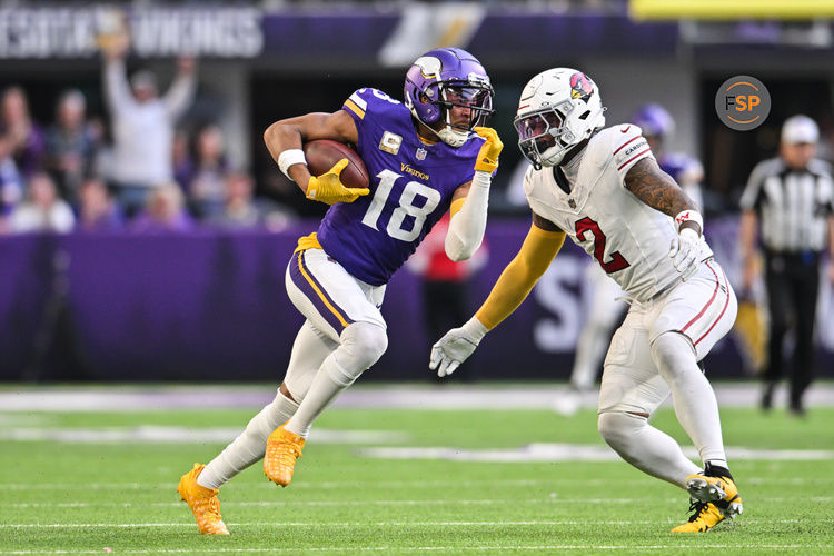 Dec 1, 2024; Minneapolis, Minnesota, USA; Minnesota Vikings wide receiver Justin Jefferson (18) gets yards after the catch as Arizona Cardinals linebacker Mack Wilson Sr. (2) looks to make the tackle during the fourth quarter at U.S. Bank Stadium. Credit: Jeffrey Becker-Imagn Images