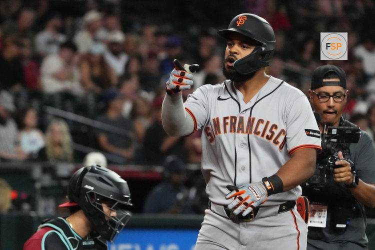 Jul 1, 2026; Phoenix, Arizona, USA; San Francisco Giants left fielder Heliot Ramos (17) reacts after hitting a solo home run against the Arizona Diamondbacks in the fifth inning at Chase Field. Credit: Rick Scuteri-Imagn Images