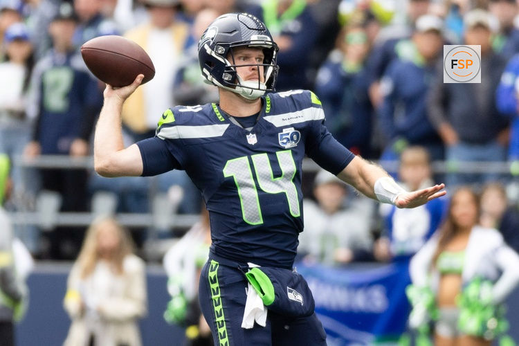 Sep 21, 2025; Seattle, Washington, USA; Seattle Seahawks quarterback Sam Darnold (14) throws the ball during the first quarter against New Orleans Saints at Lumen Field. Credit: Joe Nicholson-Imagn Images