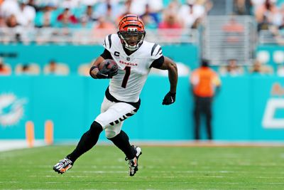 (EDITORS NOTE: caption correction) Dec 21, 2025; Miami Gardens, Florida, USA; Cincinnati Bengals receiver Ja'Marr Chase (1) runs the ball during the second quarter against the Cincinnati Bengals at Hard Rock Stadium. Mandatory Credit: Nathan Ray Seebeck-Imagn Images