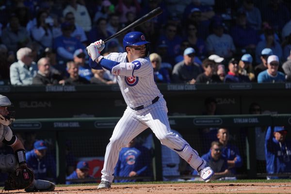 Feb 20, 2026; Mesa, Arizona, USA; Chicago Cubs right fielder Seiya Suzuki (27) hits against the Chicago White Sox in the first inning at Sloan Park. Mandatory Credit: Rick Scuteri-Imagn Images
