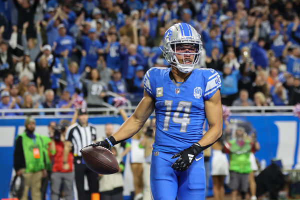 DETROIT, MI - NOVEMBER 19:  Detroit Lions wide receiver Amon-Ra St. Brown (14) looks on after catching a pass in the end zone for a touchdown during an NFL football game between the Chicago Bears and the Detroit Lions on November 19, 2023 at Ford Field in Detroit, Michigan.  (Photo by Scott W. Grau/Icon Sportswire)