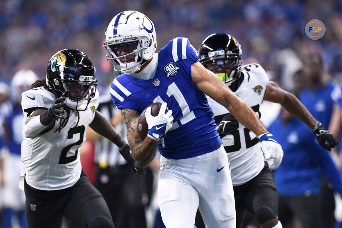 INDIANAPOLIS, IN - SEPTEMBER 10: Indianapolis Colts Wide Receiver Michael Pittman (11) carries the ball for a touchdown during the NFL game between the Jacksonville Jaguars and the Indianapolis Colts on September 10, 2023, at Lucas Oil Stadium in Indianapolis, Indiana. (Photo by Michael Allio/Icon Sportswire)