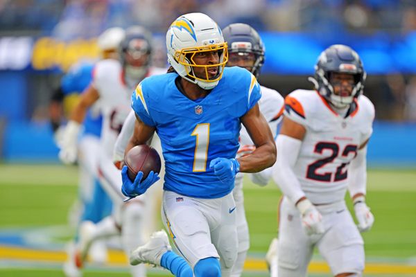 Sep 21, 2025; Inglewood, California, USA; Los Angeles Chargers wide receiver Quentin Johnston (1) runs the ball during the first half against the Denver Broncos at SoFi Stadium. Mandatory Credit: Jayne Kamin-Oncea-Imagn Images