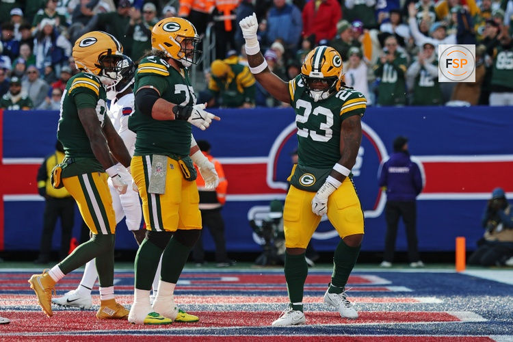 Nov 16, 2025; East Rutherford, New Jersey, USA; Green Bay Packers running back Emanuel Wilson (23) celebrates after scoring a touchdown during the second quarter against the New York Giants at MetLife Stadium. Credit: Vincent Carchietta-Imagn Images