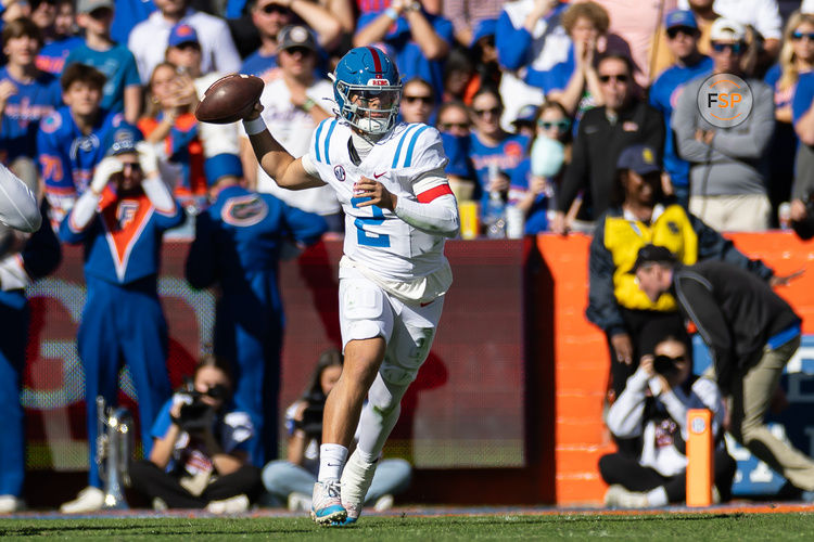 Nov 23, 2024; Gainesville, Florida, USA; Mississippi Rebels quarterback Jaxson Dart (2) throws the ball against the Florida Gators during the first half at Ben Hill Griffin Stadium. Credit: Matt Pendleton-Imagn Images