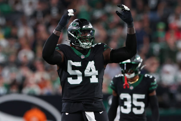 Oct 31, 2024; East Rutherford, New Jersey, USA; New York Jets defensive tackle Javon Kinlaw (54) reacts during the first half of their game against the Houston Texans at MetLife Stadium. Mandatory Credit: Ed Mulholland-Imagn Images