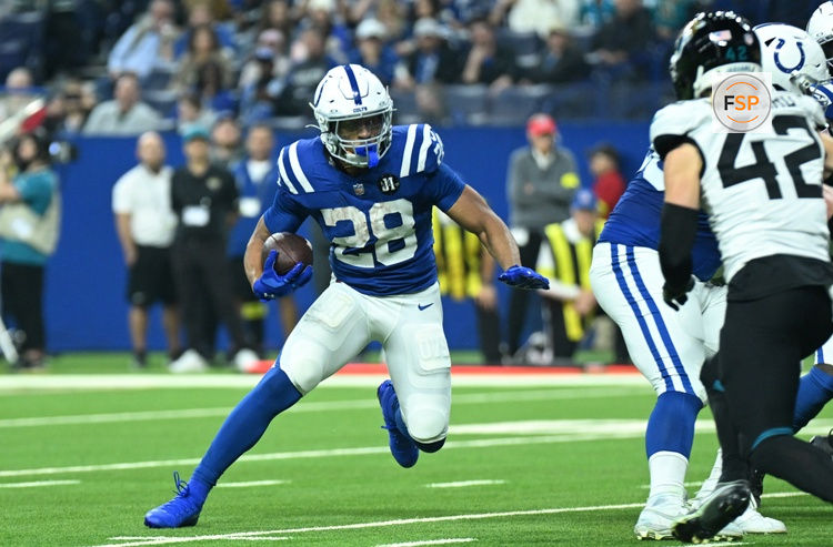Dec 28, 2025; Indianapolis, Indiana, USA; Indianapolis Colts running back Jonathan Taylor (28) runs during the first half against the Jacksonville Jaguars at Lucas Oil Stadium. Credit: Robert Goddin-Imagn Images