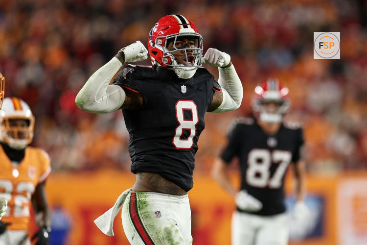 Dec 11, 2025; Tampa, Florida, USA; Atlanta Falcons tight end Kyle Pitts Sr. (8) reacts after catching a pass against the Tampa Bay Buccaneers during the second quarter at Raymond James Stadium. Credit: Nathan Ray Seebeck-Imagn Images