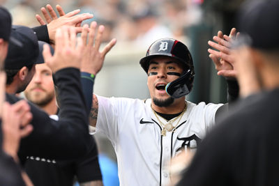 Jun 6, 2025; Detroit, Michigan, USA;  Detroit Tigers shortstop Javier Baez (28) celebrates in the dugout after scoring a run against the Chicago Cubs in the fifth inning at Comerica Park. Mandatory Credit: Lon Horwedel-Imagn Images