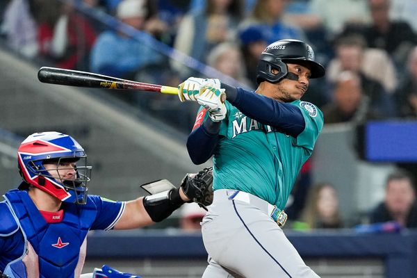 Oct 13, 2025; Toronto, Ontario, CAN; Seattle Mariners infielder Jorge Polanco (7) singles in the seventh inning against the Toronto Blue Jays during game two of the ALCS round for the 2025 MLB playoffs at Rogers Centre. Mandatory Credit: Nick Turchiaro-Imagn Images
