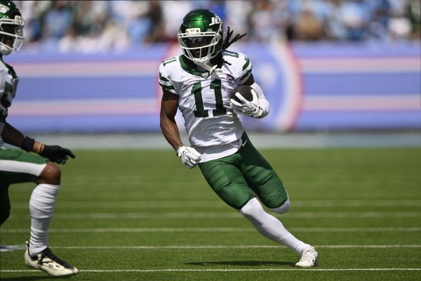 Sep 13, 2026; Nashville, Tennessee, USA;  New York Jets wide receiver Omar Cooper Jr. (11) runs with the ball against the Tennessee Titans during the first quarter at Nissan Stadium.  Mandatory Credit: Steve Roberts-Imagn Images