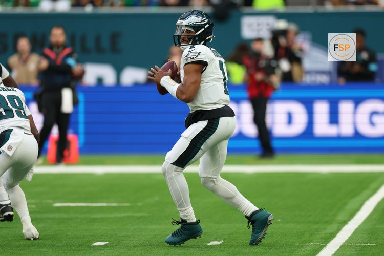 Oct 11, 2026; Tottenham, ENG;  Philadelphia Eagles quarterback Jalen Hurts (1) throws the ball during the fourth quarter against the Jacksonville Jaguars at Tottenham Hotspur Stadium.  Credit: Nathan Ray Seebeck-Imagn Images