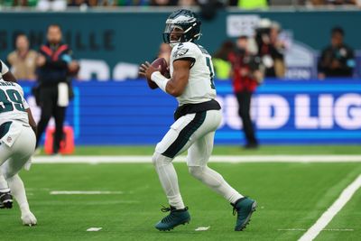Oct 11, 2026; Tottenham, ENG;  Philadelphia Eagles quarterback Jalen Hurts (1) throws the ball during the fourth quarter against the Jacksonville Jaguars at Tottenham Hotspur Stadium.  Mandatory Credit: Nathan Ray Seebeck-Imagn Images