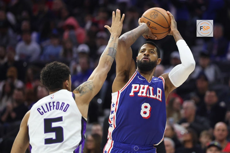 Jan 29, 2026; Philadelphia, Pennsylvania, USA; Philadelphia 76ers forward Paul George (8) shoots in front of Sacramento Kings guard Nique Clifford (5) during the third quarter at Xfinity Mobile Arena. Credit: Bill Streicher-Imagn Images