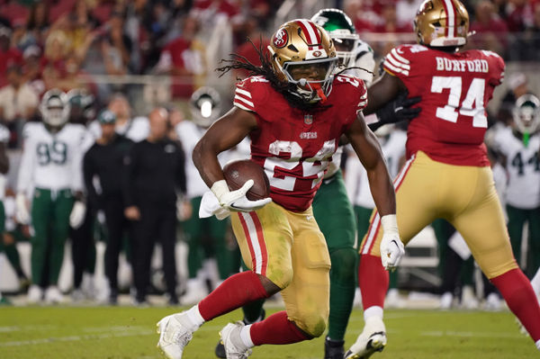 Sep 9, 2024; Santa Clara, California, USA; San Francisco 49ers running back Jordan Mason (24) rushes against the New York Jets in the fourth quarter at Levi's Stadium. Mandatory Credit: David Gonzales-Imagn Images