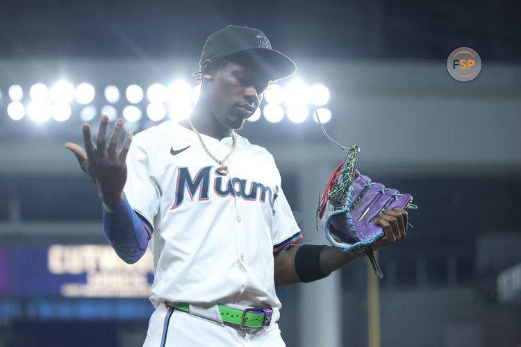 MIAMI, FL - JULY 24: Miami Marlins outfielder Jazz Chisholm Jr. (2) shows a fan he has no ball to toss them in between innings during the game between the Baltimore Orioles and the Miami Marlins on Wednesday, July 24, 2024 at LoanDepot Park in Miami, Fla. (Photo by Peter Joneleit/Icon Sportswire)