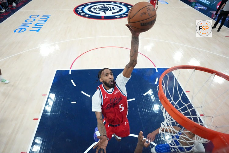 Feb 22, 2026; Inglewood, California, USA; LA Clippers forward Derrick Jones Jr. (5) shoots the ball against the Orlando Magic in the second half at Intuit Dome. Credit: Kirby Lee-Imagn Images