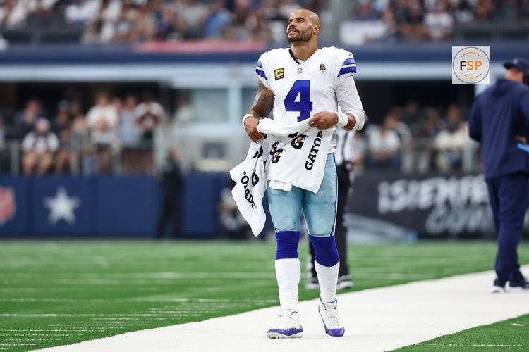 Sep 14, 2025; Arlington, Texas, USA; Dallas Cowboys quarterback Dak Prescott (4) reacts on the sideline during overtime against the New York Giants at AT&T Stadium. Credit: Kevin Jairaj-Imagn Images
