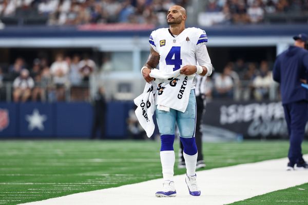 Sep 14, 2025; Arlington, Texas, USA; Dallas Cowboys quarterback Dak Prescott (4) reacts on the sideline during overtime against the New York Giants at AT&T Stadium. Mandatory Credit: Kevin Jairaj-Imagn Images
