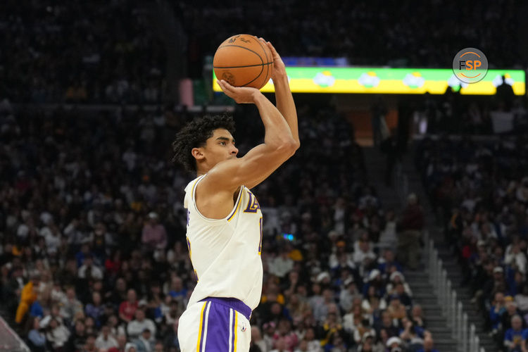 Dec 25, 2024; San Francisco, California, USA; Los Angeles Lakers guard Max Christie (12) shoots against the Golden State Warriors during the second quarter at Chase Center. Credit: Darren Yamashita-Imagn Images