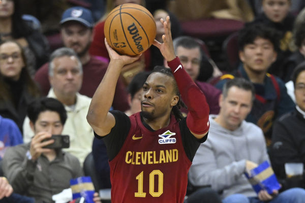 Dec 1, 2024; Cleveland, Ohio, USA; Cleveland Cavaliers guard Darius Garland (10) shoots in the third quarter against the Boston Celtics at Rocket Mortgage FieldHouse. Mandatory Credit: David Richard-Imagn Images