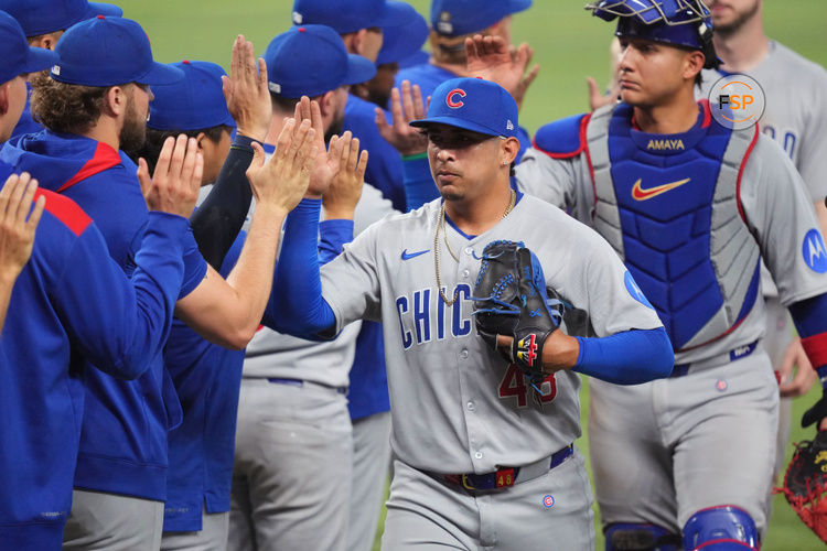 May 21, 2025; Miami, Florida, USA;  Chicago Cubs pitcher Daniel Palencia (48) celebrates a win over the Miami Marlins at loanDepot Park. Credit: Jim Rassol-Imagn Images