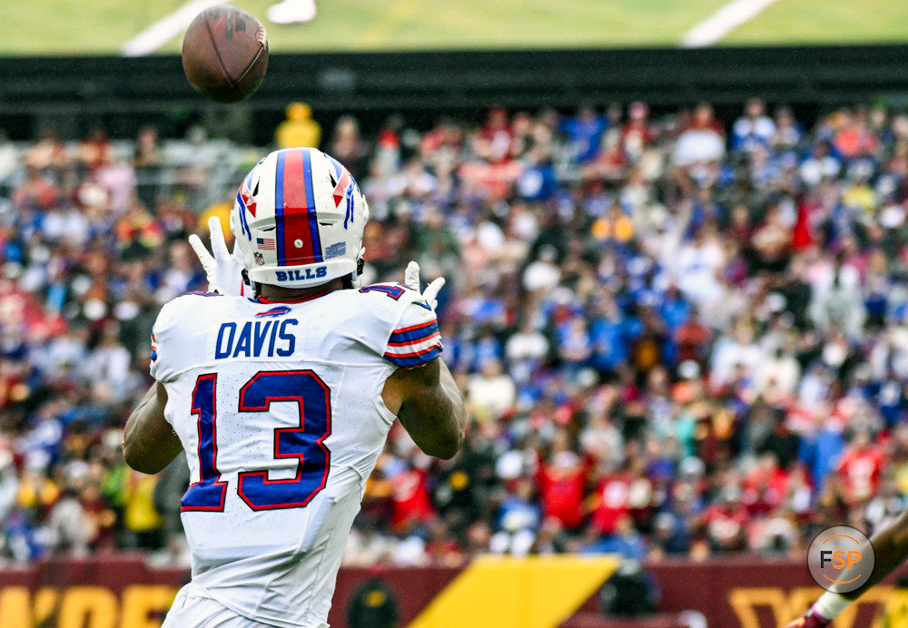 LANDOVER, MD - SEPTEMBER 24: Buffalo Bills wide receiver Gabe Davis (13) catches a touchdown  pass during the NFL game between the Buffalo Bills and the Washington Commanders on September 24, 2023 at Fed Ex Field in Landover, MD.  (Photo by Mark Goldman/Icon Sportswire)