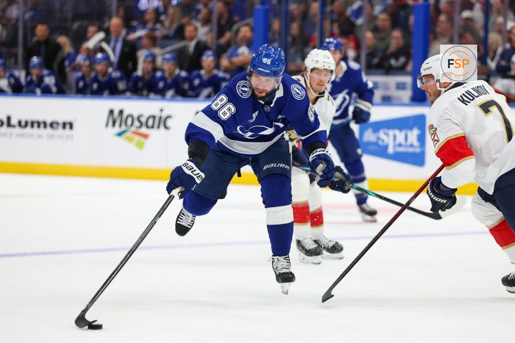 Oct 2, 2025; Tampa, Florida, USA; Tampa Bay Lightning right wing Nikita Kucherov (86) controls the puck against the Florida Panthers in the first period at Benchmark International Arena. Credit: Nathan Ray Seebeck-Imagn Images