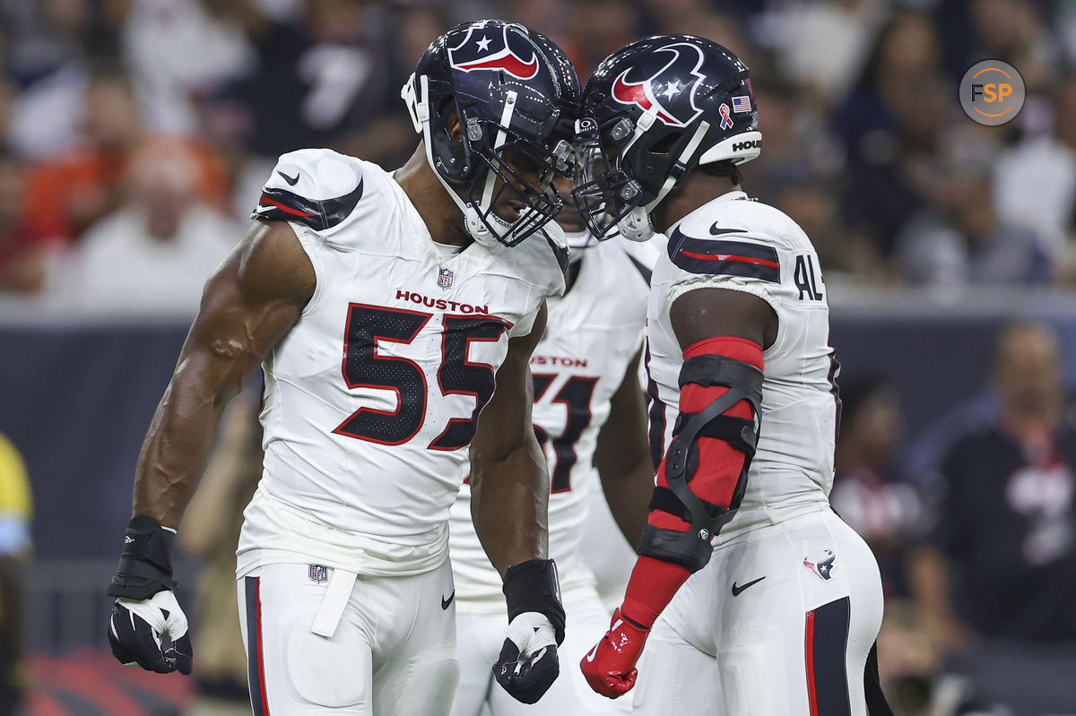 Sep 15, 2024; Houston, Texas, USA; Houston Texans defensive end Danielle Hunter (55) and linebacker Azeez Al-Shaair (0) react after a play during the first quarter against the Chicago Bears at NRG Stadium. Credit: Troy Taormina-Imagn Images