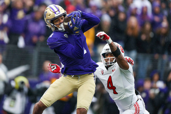 SEATTLE, WA - November 11:  Washington #1 (WR) Rome Odunze hauls in a Michael Penix Jr pass in third quarter during a college football game between the Washington Huskies and the Utah Utes on November 11, 2023 at Husky Stadium in Seattle, WA. (Photo by Jesse Beals/Icon Sportswire)