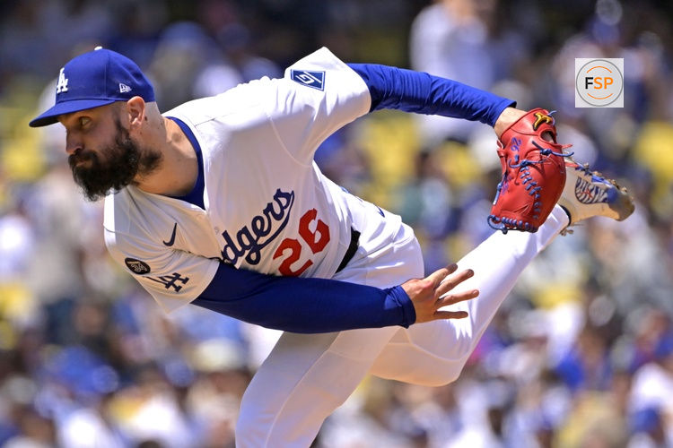Apr 30, 2025; Los Angeles, California, USA;  Los Angeles Dodgers starting pitcher Tony Gonsolin (26) delivers to the plate in the fourth inning against the Miami Marlins at Dodger Stadium. Credit: Jayne Kamin-Oncea-Imagn Images