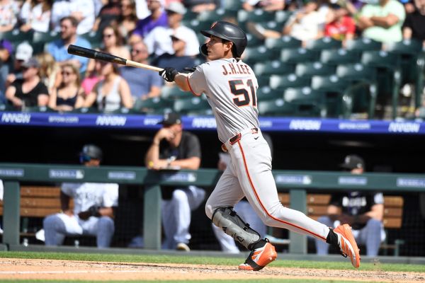 May 31, 2026; Denver, Colorado, USA; San Francisco Giants outfielder Jung Hoo Lee (51) hits an RBI single in the seventh inning against the Colorado Rockies at Coors Field. Mandatory Credit: Christopher Hanewinckel-Imagn Images