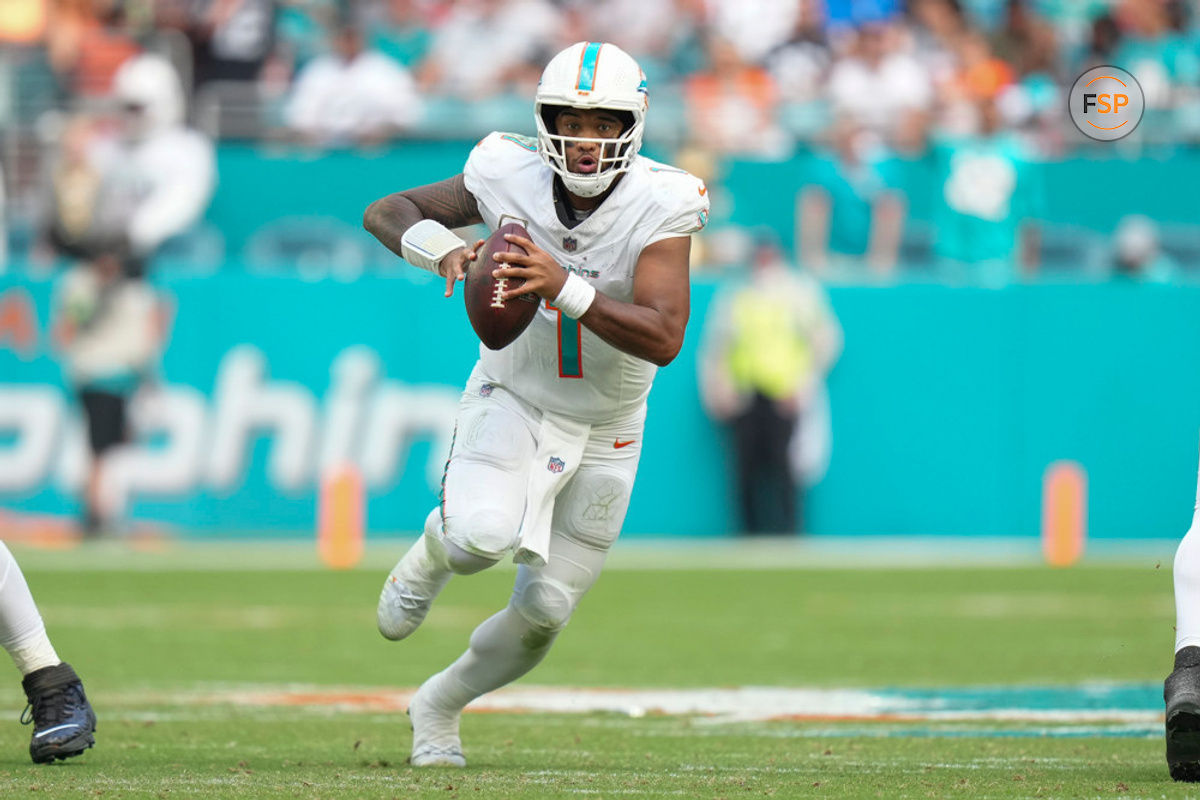 MIAMI GARDENS, FL - NOVEMBER 19: Miami Dolphins quarterback Tua Tagovailoa (1) scrambles with the ball during the game between the Las Vegas Raiders and the Miami Dolphins on Sunday, November 19, 2023 at Hard Rock Stadium, Miami, Fla. (Photo by Peter Joneleit/Icon Sportswire)