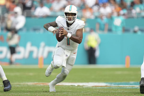 MIAMI GARDENS, FL - NOVEMBER 19: Miami Dolphins quarterback Tua Tagovailoa (1) scrambles with the ball during the game between the Las Vegas Raiders and the Miami Dolphins on Sunday, November 19, 2023 at Hard Rock Stadium, Miami, Fla. (Photo by Peter Joneleit/Icon Sportswire)